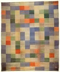 Diseño textil de Gertrud Arndt, ejemplo de la mujer en la Bauhaus, de cuadros de colores.